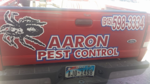 The back of an Aaron Pest Control truck with pest control equipment in El Paso, TX, ready for a job.
