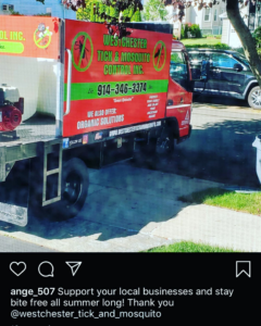 A Westchester Tick and Mosquito Control truck spraying for pest control in New Rochelle, NY.