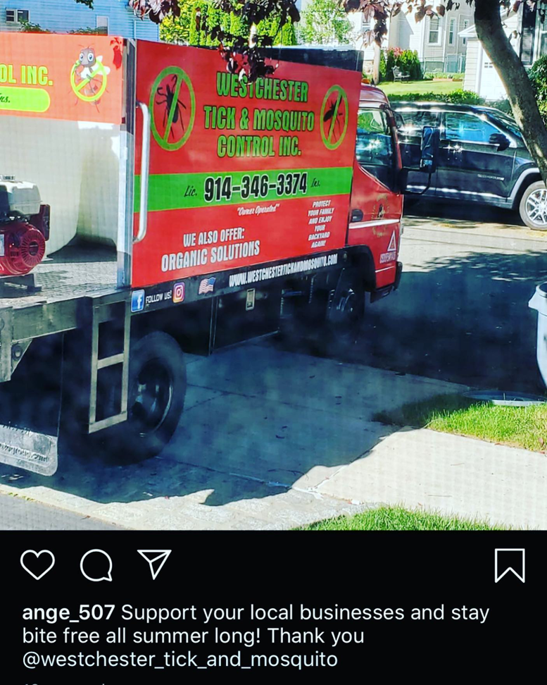 A Westchester Tick and Mosquito Control truck spraying for pest control in New Rochelle, NY.