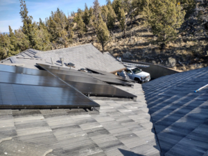 Pest exclusion mesh installed under solar panels on a residential roof by Solid Pest Solutions in Bend, OR.