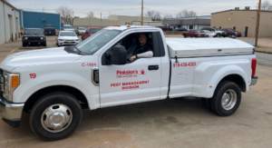 A Pinkston's Turf Services Pest Management Division truck in Tulsa, OK, ready for wildlife and pest control jobs.