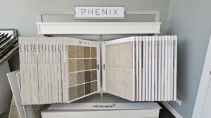 A showroom display featuring various Phenix carpet samples for selection at Carpets Direct Naperville, IL.