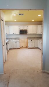 A pickup truck loaded with rolled carpet for removal or installation by Arizona Home Floors Dust Free Tile Removal in Tempe, AZ.