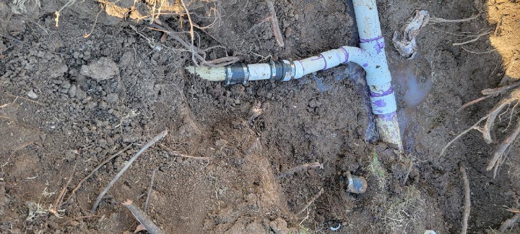A plumbing pipe connection being repaired by Call The Doc Air Doctor Heating, Air Conditioning and Plumbing in Richardson, TX.