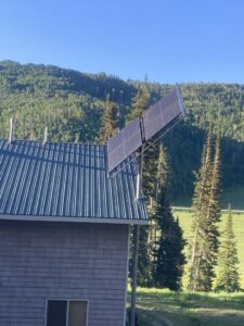 Pole-mounted solar panels installed in a rural setting by All Aboard Services in Farr West, UT.