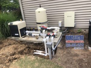 Electrical hookup and wiring for pool equipment, including pumps and heaters, completed by Kouris Electric LLC in Canton, OH.