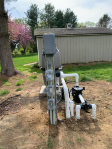 Electrical wiring and conduits connected to a pool pump and filter system by K E Troutman Electrical Contractor in Newark, DE.