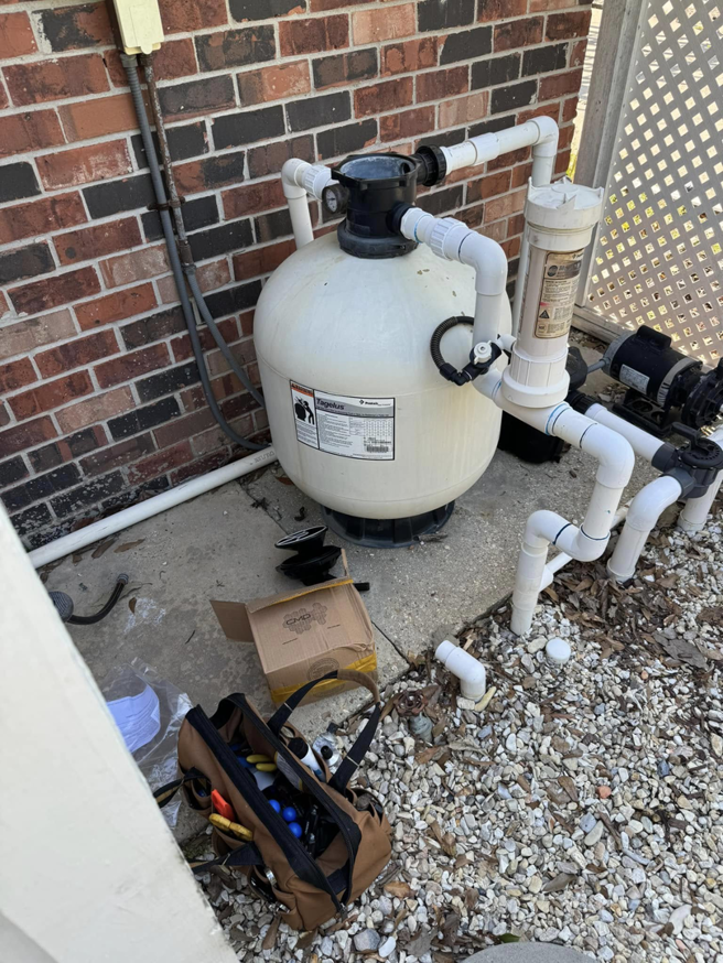 Pool equipment and a toolbox, indicating repair or service work by Brocks Pools LLC in Baton Rouge, LA.