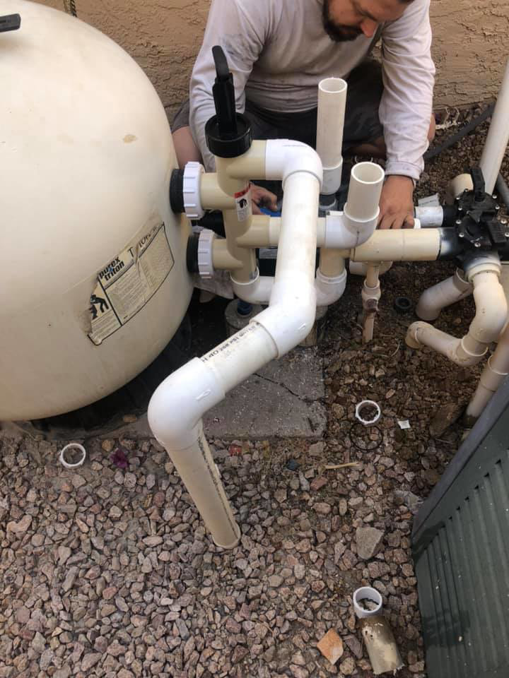 A complete pool equipment setup with filter, pump, and pipes for BEHR POOLS Service & Repairs in Glendale, AZ