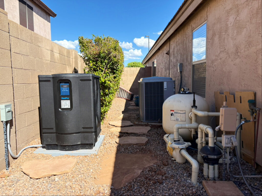 A comprehensive pool heater and filter system, showcasing the equipment maintained by Edward's Pool Service, LLC in Gilbert, AZ.