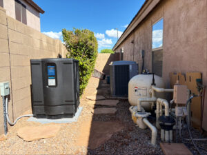 A comprehensive pool heater and filter system, showcasing the equipment maintained by Edward's Pool Service, LLC in Gilbert, AZ.