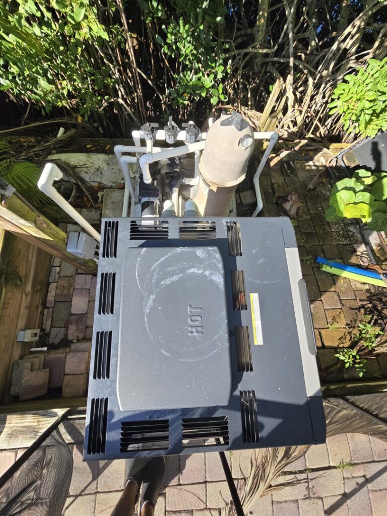 Essential pool heater and pump equipment maintained by Summer Breeze Pool Services in Fayetteville, GA.