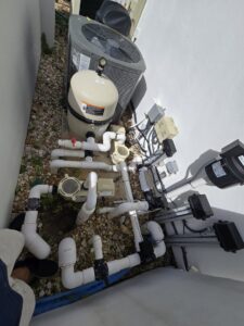 A well-maintained pool pump and filter system serviced by Summer Breeze Pool Services in Fayetteville, GA.