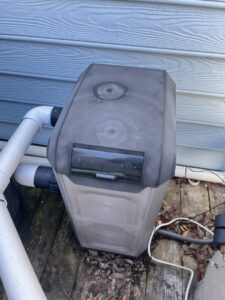 An outdoor pool pump with visible electrical wiring and conduit installed by Safewater Electric in North Charleston, SC.
