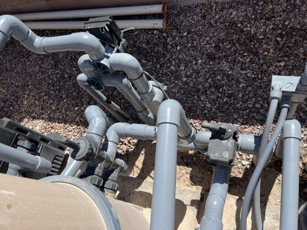 Cloudy pool water indicating a chemical treatment or cleaning in progress by Classic Pool Service in Surprise, AZ