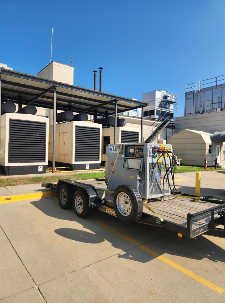 A portable generator on a trailer connected to a commercial building by GenTec Service and Repair in Bossier City, LA