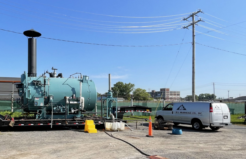 A portable industrial boiler unit on-site for service by BJ Muirhead Co., Inc. in Orchard Park, NY.