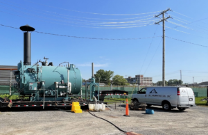 A portable industrial boiler unit on-site for service by BJ Muirhead Co., Inc. in Orchard Park, NY.