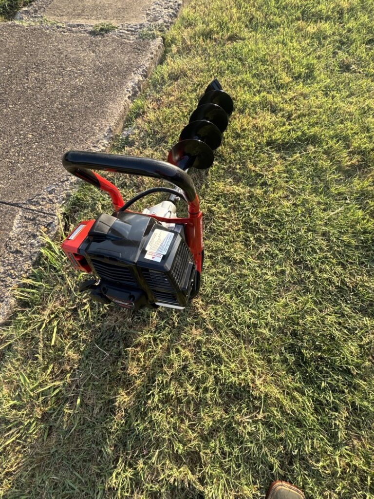 A power auger, a tool used for installing pest control devices or bait stations by Drapers Pest Management in Fort Worth, TX.