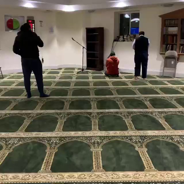 A prayer room with green patterned carpet installed, serving clients of Musalla Masjid Carpets in Glendale Heights, IL.