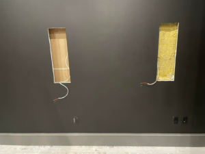 Pre-wiring for wall-mounted components and electrical outlets by Heritage Electric in Bluffton, SC.