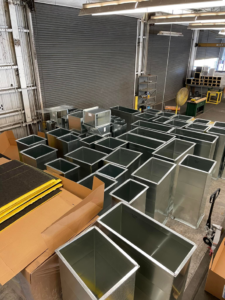 Prefabricated rectangular HVAC ductwork sections ready for installation by Southern Equipment Corporation in Tampa, FL