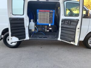 Prochem Apex carpet cleaning equipment inside a service van for Andy's Cleaning Company LLC in Topeka, KS.