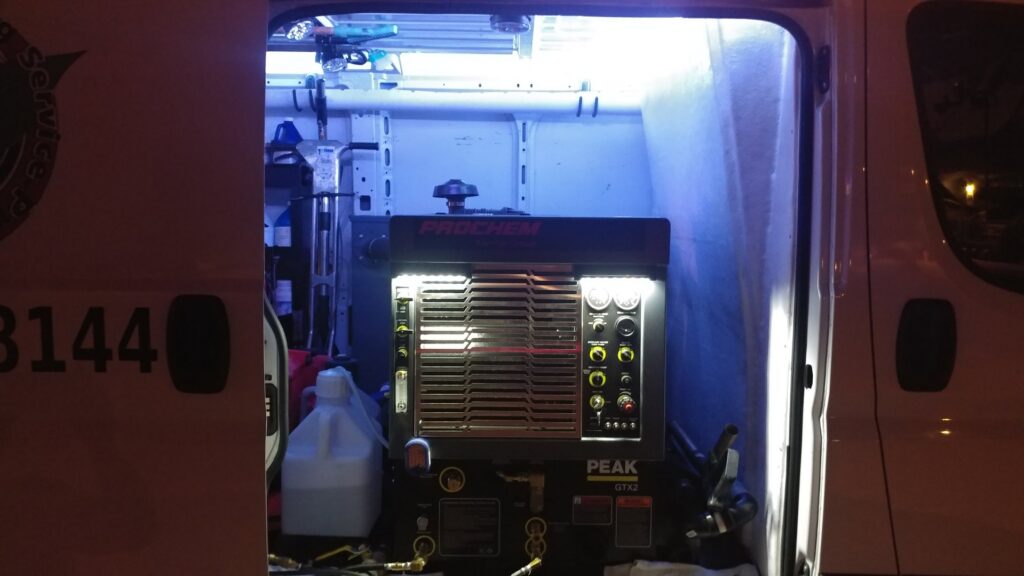A Prochem Peak GTX2 carpet cleaning machine inside a service van for Cleaning Service Pro, LLC in Peoria, AZ
