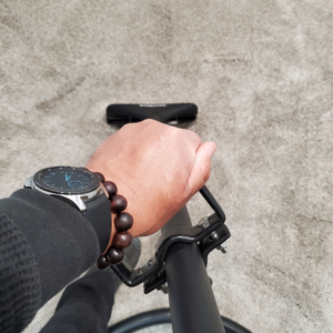 A professional performing carpet cleaning with a wand tool for Genie Clean Services LLC in Dallas, TX.