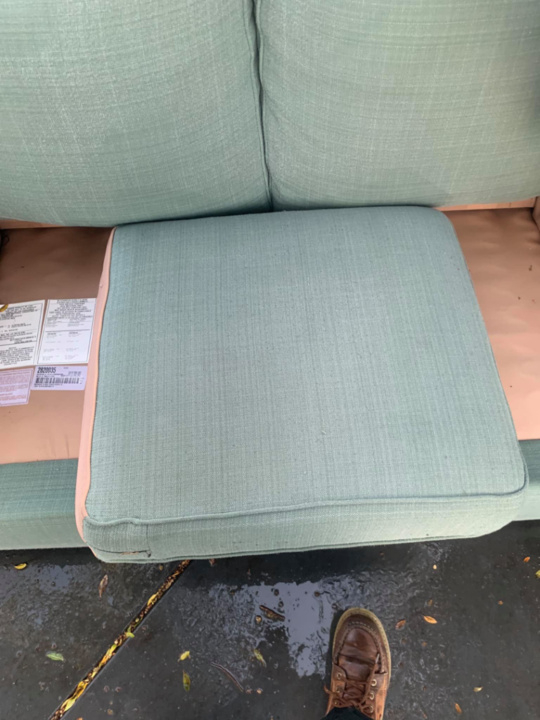 A professional technician using a carpet cleaning wand to clean a carpeted floor for Murcia's Carpet Cleaning in San Leandro, CA.