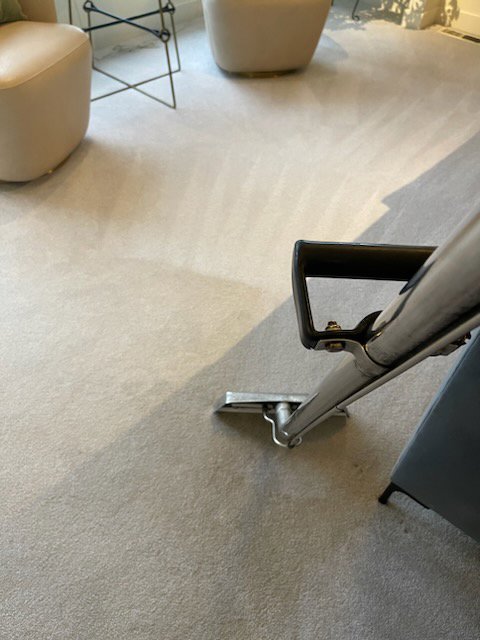 Professional carpet cleaning in progress on a light-colored carpet by Spot Free Cleaning Services in Brownsburg, IN.