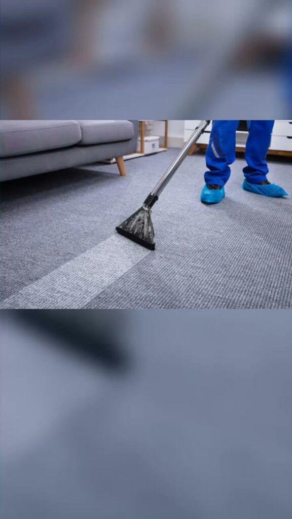 A professional cleaning a grey carpet with a cleaning wand by Ready2go Professional Carpet & Upholstery Cleaning in Boston, MA