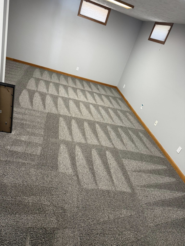 Professional carpet cleaning results with clear vacuum lines by Midwest Carpet Rescue in Omaha, NE.