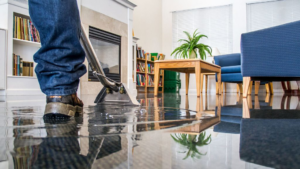 A professional performing a deep carpet cleaning service with a wand at All Kleen Carpet Cleaning in Mountlake Terrace, WA.