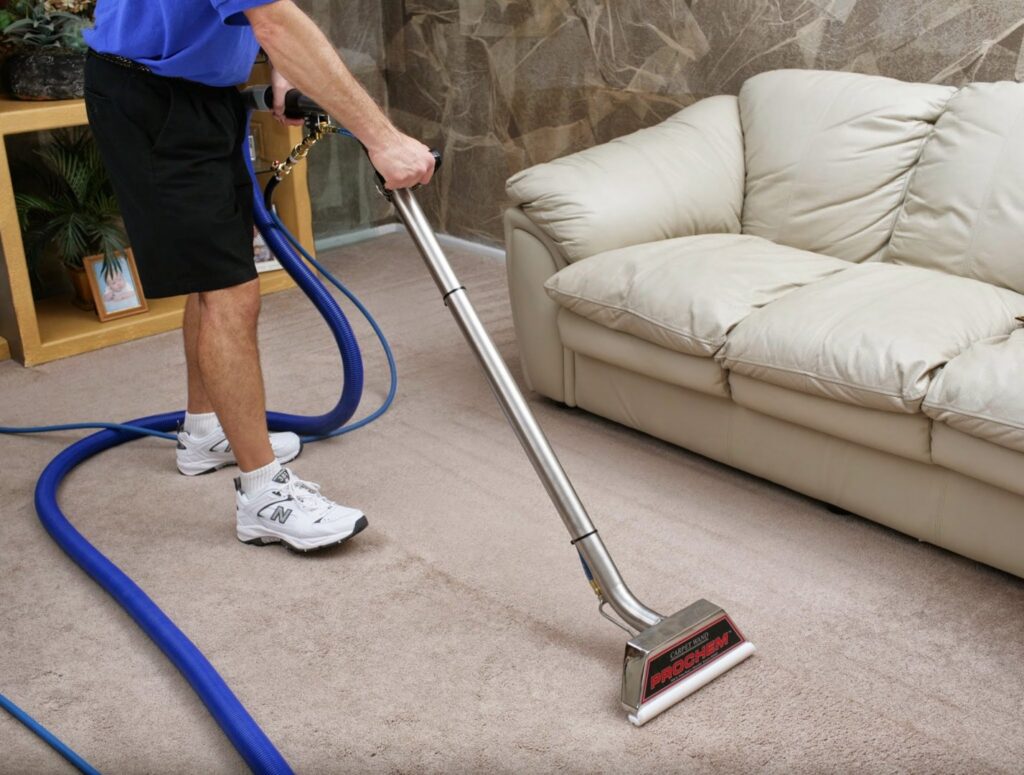 A professional performing carpet cleaning services for a client by Integrity Carpet Cleaning Services in Los Gatos, CA.
