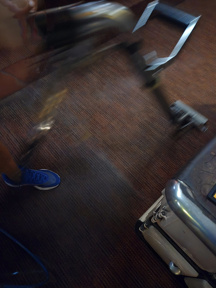 Professional carpet cleaning service in action on a brown carpet by On The Spot Carpet and Upholstery Cleaning in Warren, MI.