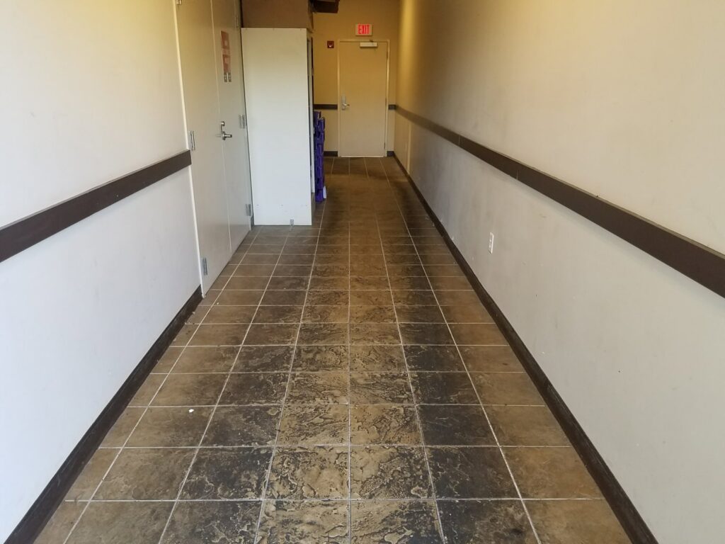 Professional cleaning of a large patterned rug with a wand by Technique Carpet & Tile Cleaning, Inc. in Winter Springs, FL.