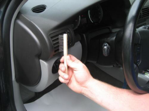 A professional carpet cleaning wand in action, cleaning a floor mat for Fiber Care Solutions in Whitinsville, MA.