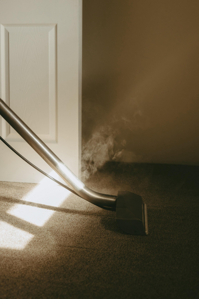 Professional carpet steam cleaning being performed by Dakota's Mr.Color in a home in Wilsonville, OR.