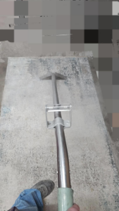 A professional rug cleaning tool in use on a large area rug by an expert from Hopman Rug Cleaners in Hammond, IN.