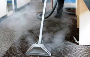 Professional steam carpet cleaning in progress by Surprise Carpet Cleaners - Carpet Cleaning Pros in Surprise, AZ