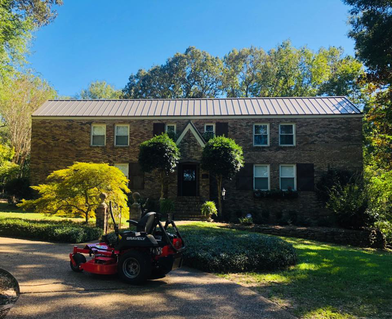 A professional zero-turn lawn mower ready for service by NewLeaf Lawn Care LLC in Dothan, AL.