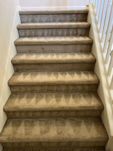 Professionally cleaned carpeted stairs with visible patterns by California Xtreme Steam in Sacramento, CA