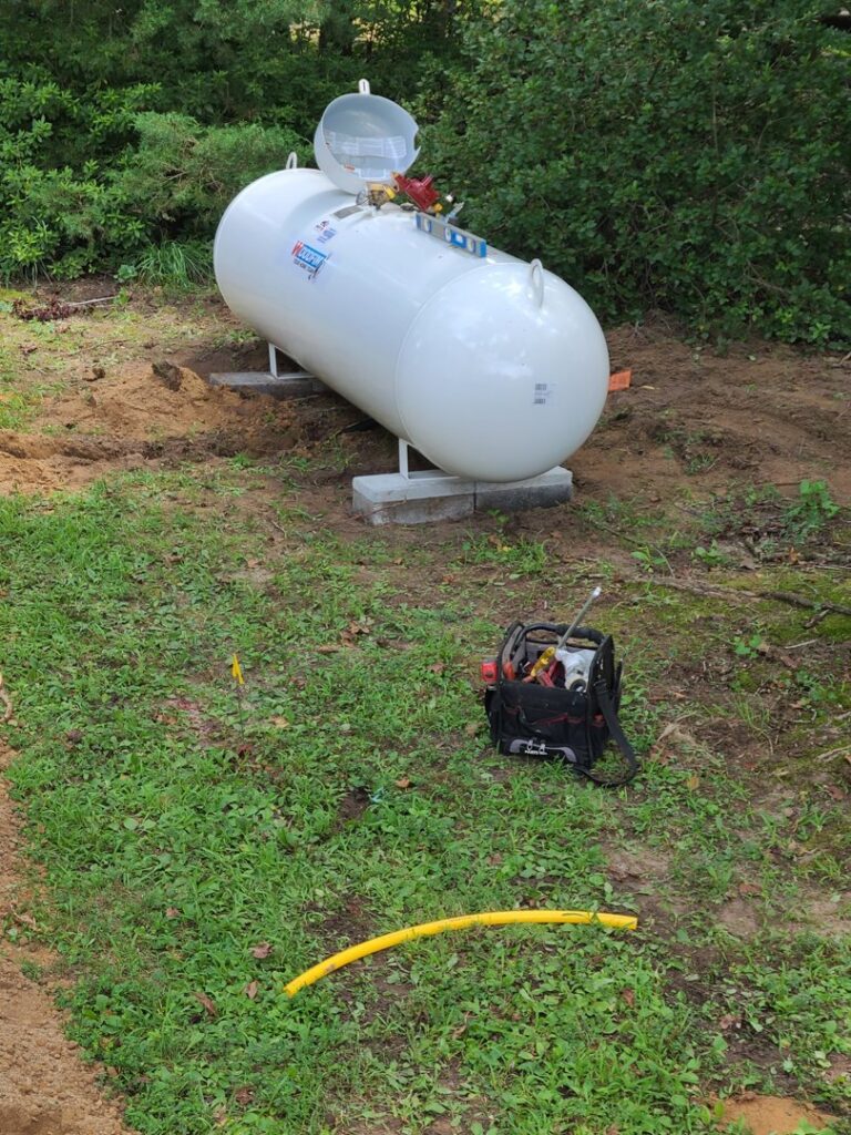 A new propane tank installation for a home heating system by Woodfin-Your Home Team in Richmond, VA.
