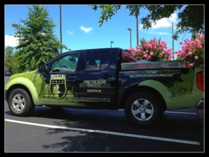 A branded Protect All Pest Control truck parked in Acworth, GA, ready for wildlife and pest control services.