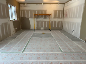 Radiant floor heating system installation in a room under construction by Carbonic Heat LLC in Lake Hopatcong, NJ