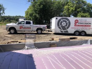 Radiant floor heating pipes being installed at a construction site by Precision Heating & Air Conditioning in Royersford, PA