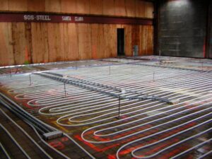 Radiant floor heating pipes laid out during installation by The Heating Specialist in Portland, OR