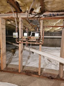 Copper piping and control valves for a radiant heating system rough-in by Perfect Temp LLC in Bozeman, MT.