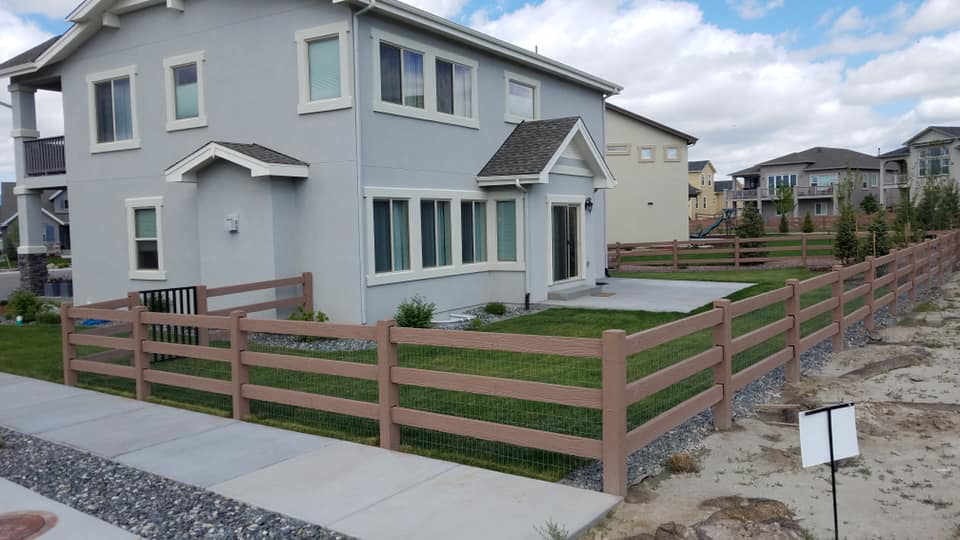 A completed ranch-style fence with wire mesh, providing a secure boundary by BroKrete Fencing LLC in Salt Lake City, UT